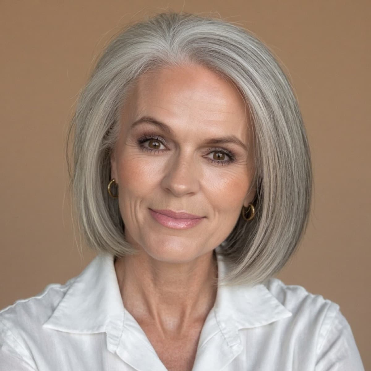 Portrait of Deanie Robertson in a white blouse